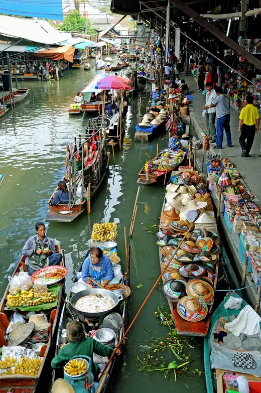 Damnoen Saduak Floating Market viewed from the canal-side walkway.